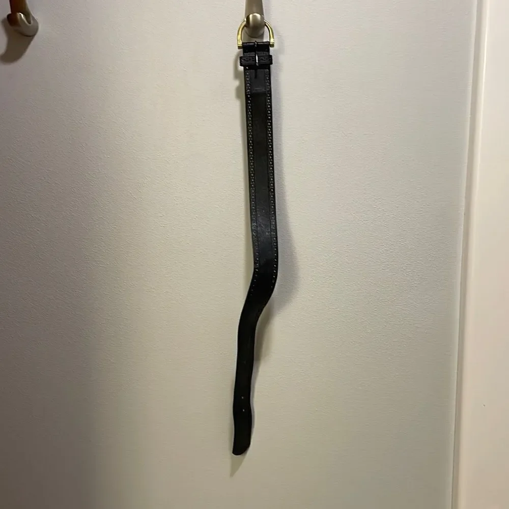 Woman’s black leather belt